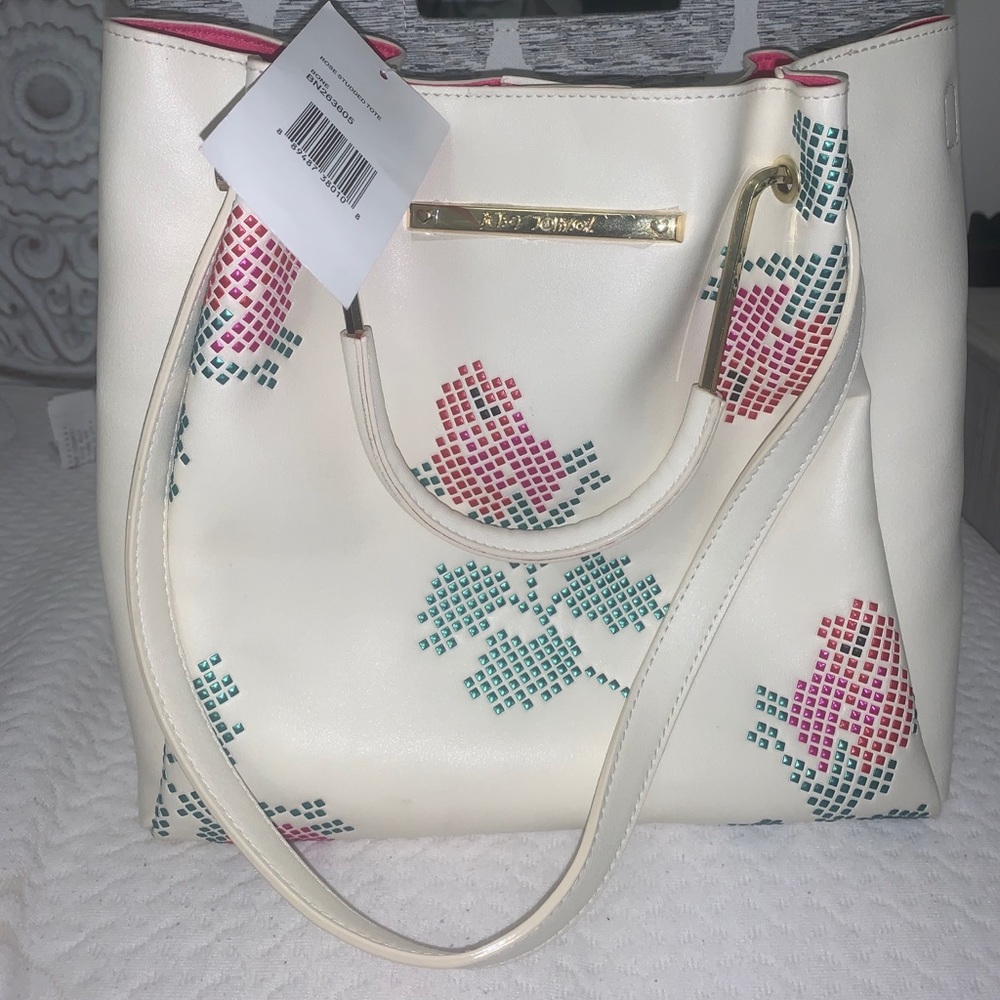 Betsy Johnson tote bag with an extra cosmetic bag
